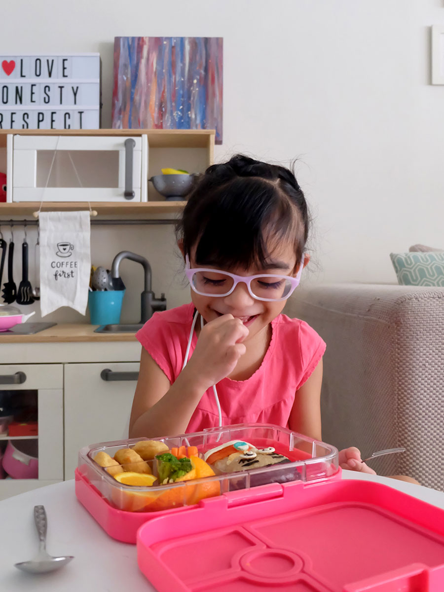 Zoë enjoying her Moana Bento Food Art