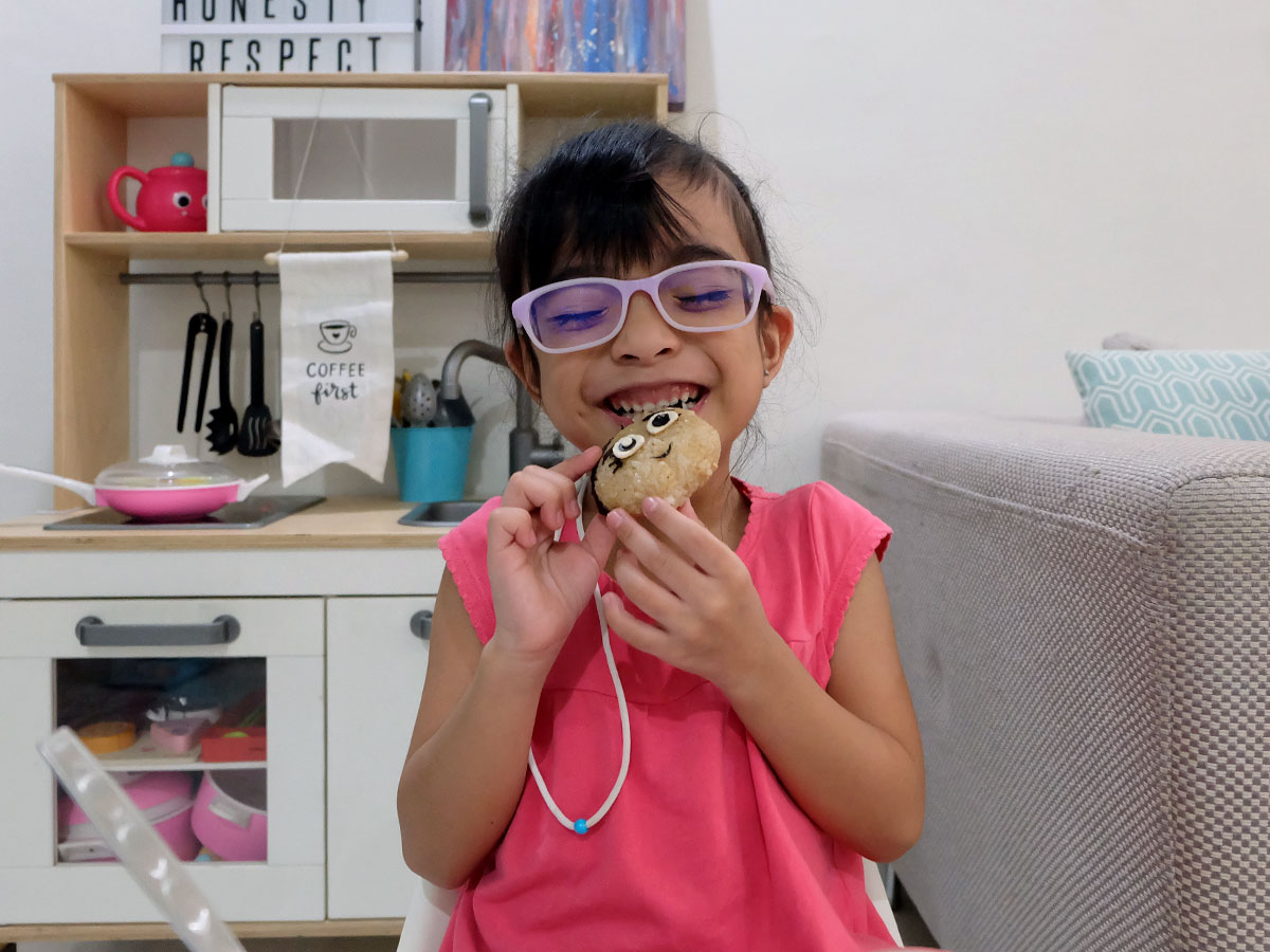 Zoë enjoying her Moana Bento Food Art