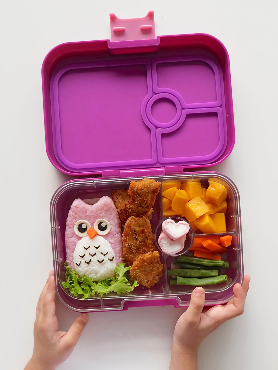 Owl bento food art inside a Yumbox Panino in Bijoux Purple